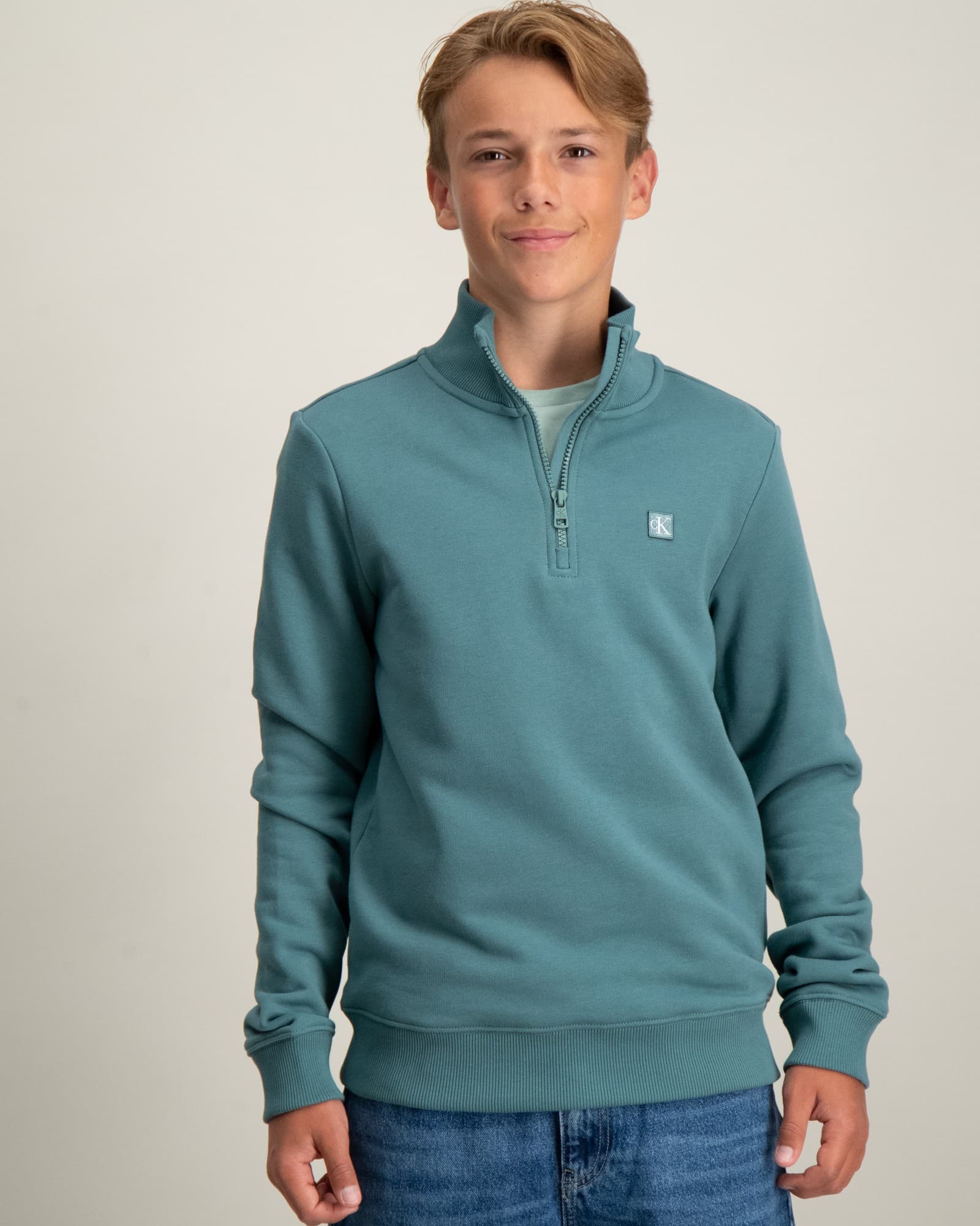 MONOGRAM MINI BADGE HALF-ZIP